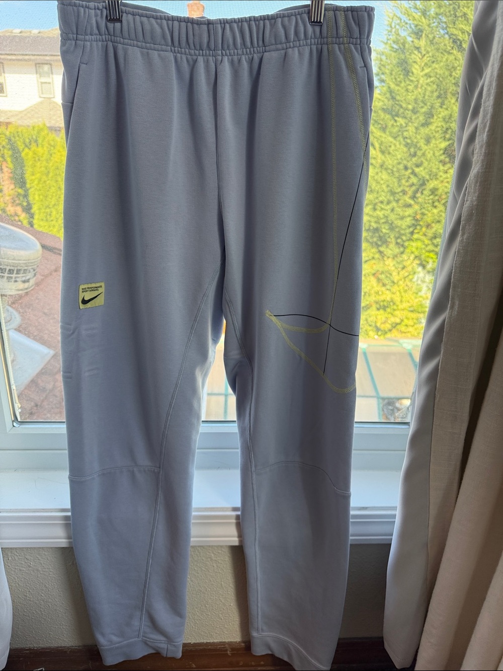 Nike Light Gray Joggers with Neon Yellow Swoosh